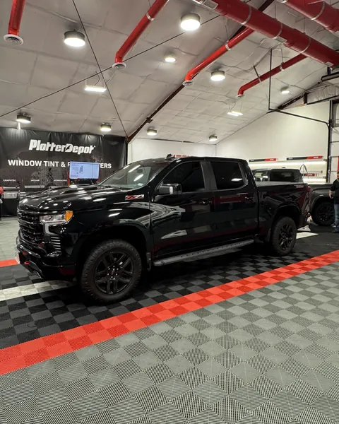 Black Chevrolet Silverado Z71 crew cab with ceramic window tint