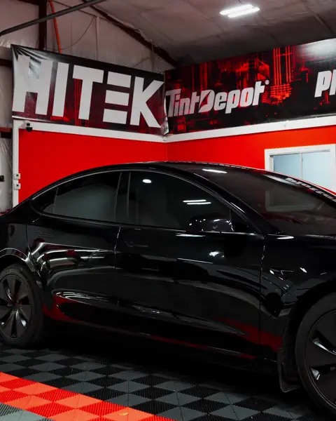 Black Tesla Model 3 with ceramic window tint