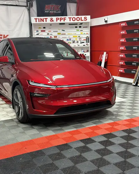 Red Tesla Model Y with ceramic window tint