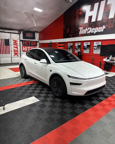White Tesla Model Y with ceramic window tint