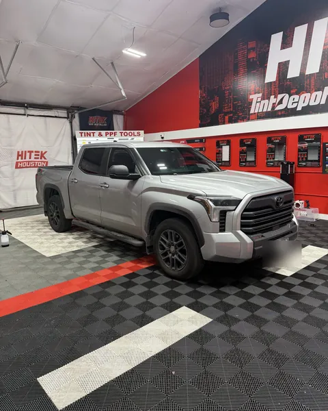 Silver Toyota Tundra CrewMax with ceramic window tint